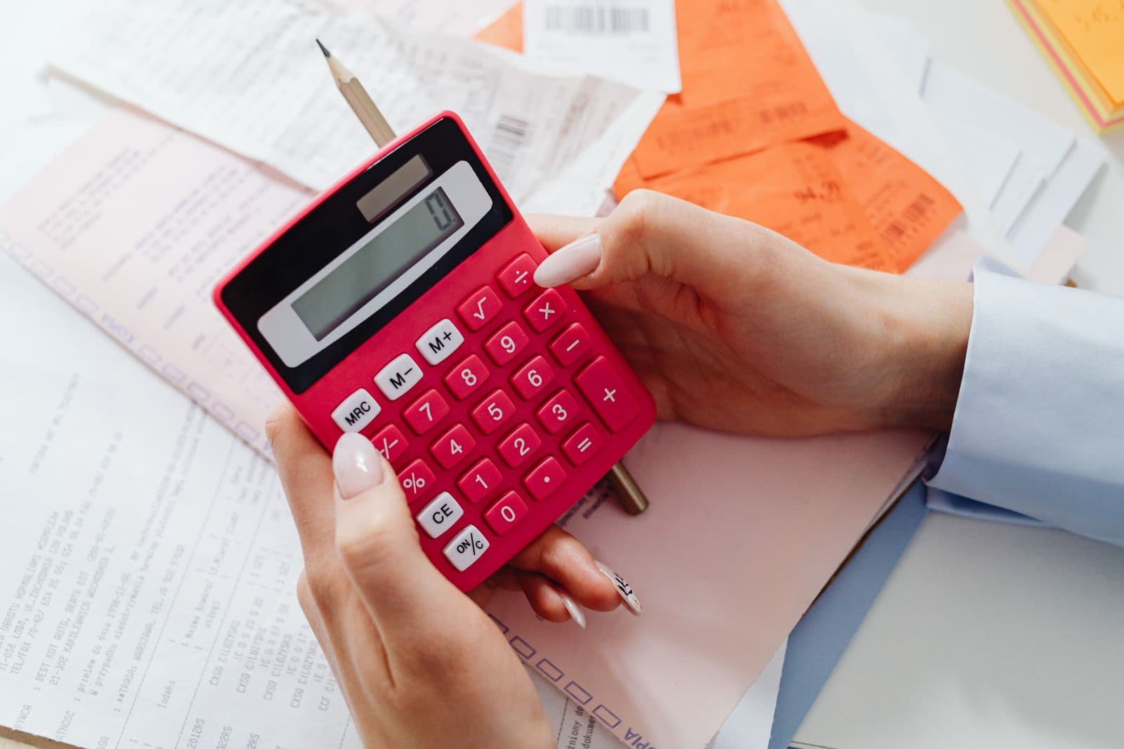 Calculator and paperwork on a desk