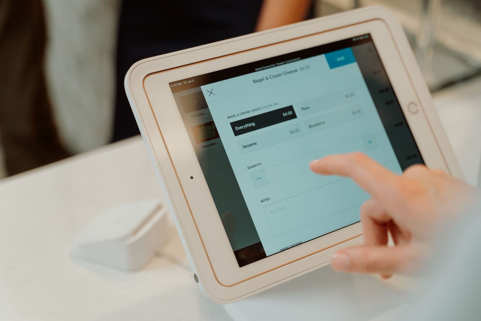 Tablet point-of-sale terminal on a counter